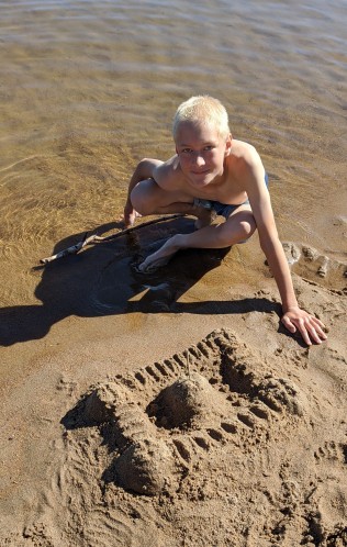 Boyd building castles in the sand